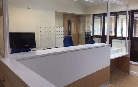 Bespoke business counter enclosed in glass